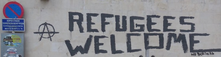 Graffiti reading 'Refugees Welcome'